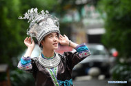 Women of Miao Ethnic Group Wear Fancy Silver Ornaments for D